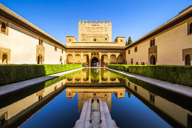Alhambra : Guided Tour & Ticket Nasrid Palaces Guaranteed - Stop 1: Entering the Alhambra with tickets in hand