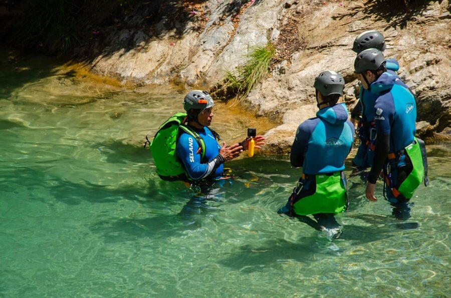 From Granada: Rio Verde Canyoning Tour with Lunch - Inside the Canyon for 3 Hours: Slides, Jumps, and Rope-Down Waterfalls