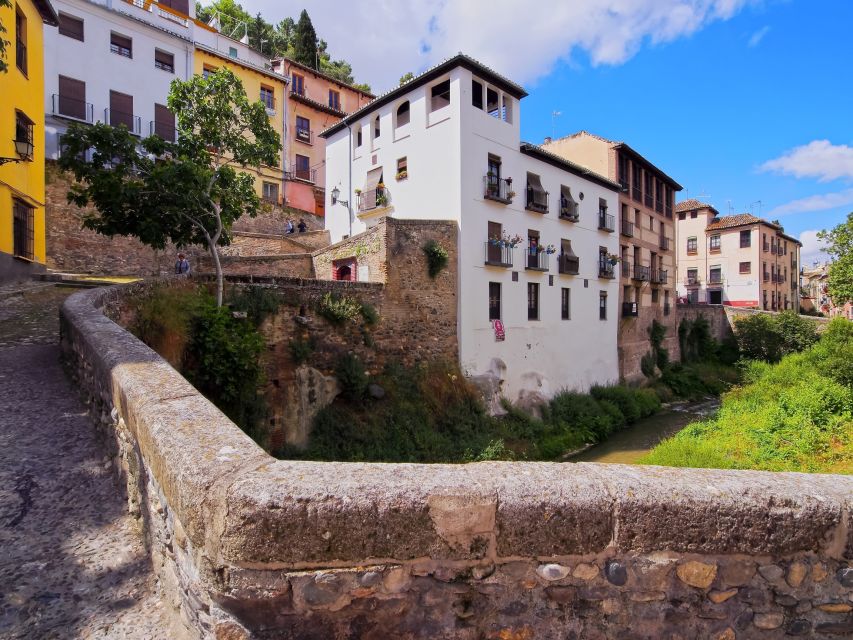Granada: Albaicín and Sacromonte Walking Tour - Puerta de las Pesas and Plaza Larga: gates, transitions, and why spacing matters