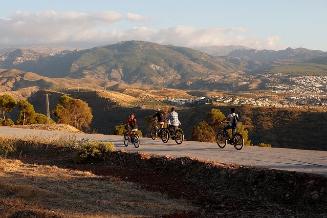Granada: Alhambra and Sierra Nevada Sunset Views by E-Bike - Sacromonte cave houses and flamenco traditions from another angle