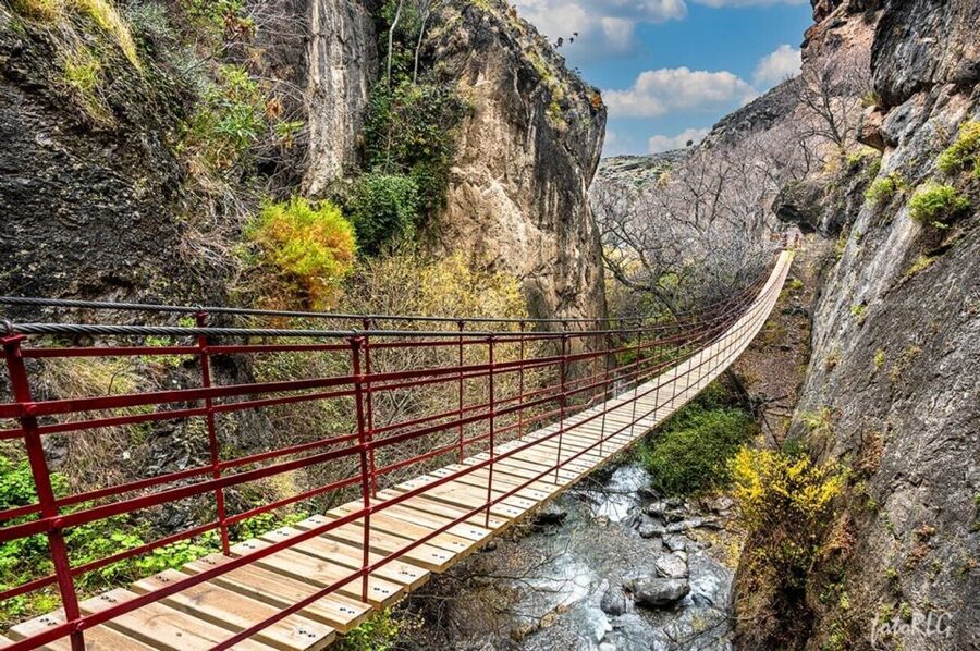 Granada: Guided Day Hike in Los Cahorros de Monachil - Return route, the suspension bridge, and riverbank stops