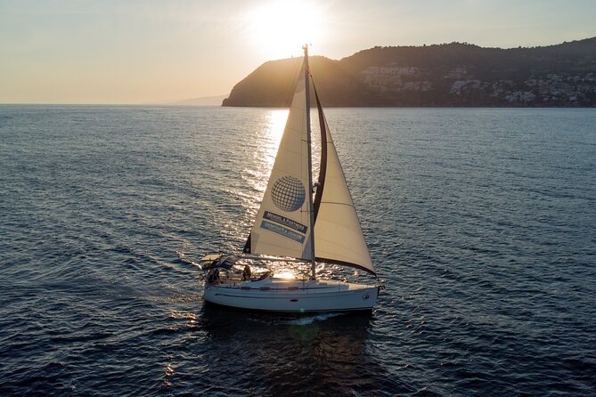 Sailing at sunset along the cliffs of Maro-Compartida - Price and Value: Is $82.80 Worth a 2-Hour Sunset Sail?