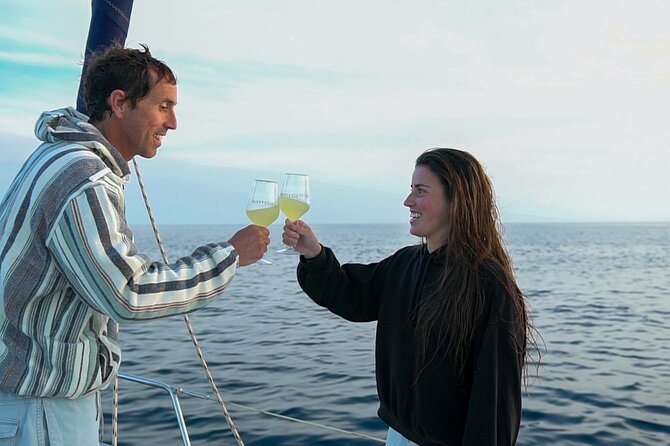 Sailing at sunset along the cliffs of Maro-Compartida - The Bavaria 37 Cruise: Comfortable, Unhurried, Built for Evening