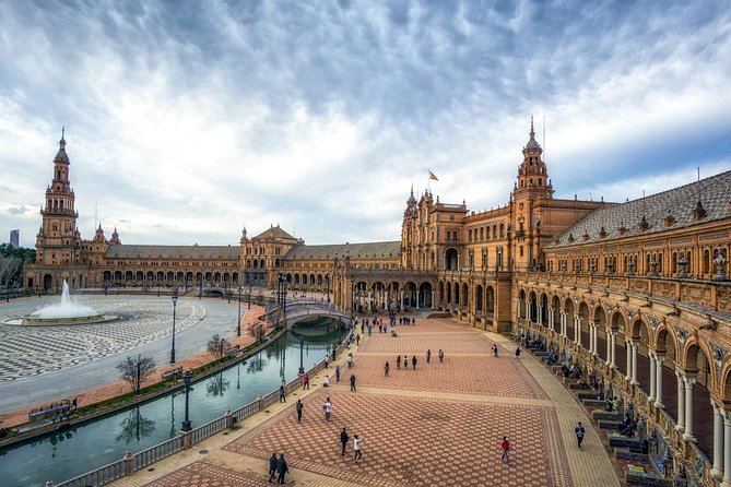 Seville Tour with Alcazar, Cathedral and Giralda from Granada - Group size, headsets, and pacing across the monuments