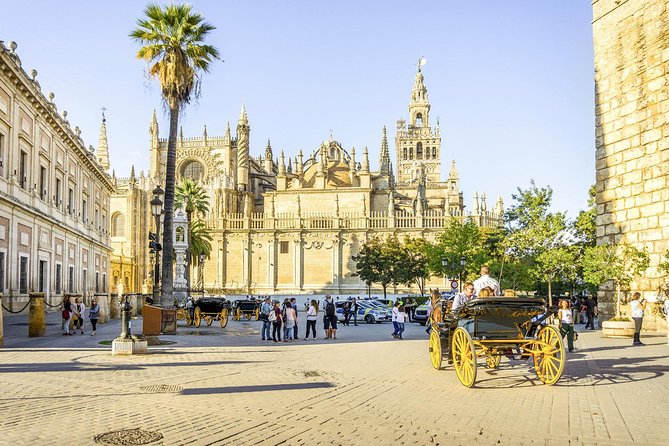Seville Tour with Alcazar, Cathedral and Giralda from Granada - Real Alcazar Palace: Moorish courtrooms and Christian additions
